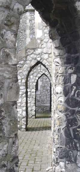 Stone arches arond church building